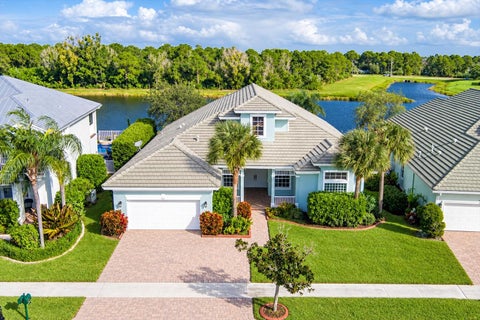 Photo of 213 Magnolia Lakes Boulevard, Port Saint Lucie, FL 34986 (MLS # B26090411)