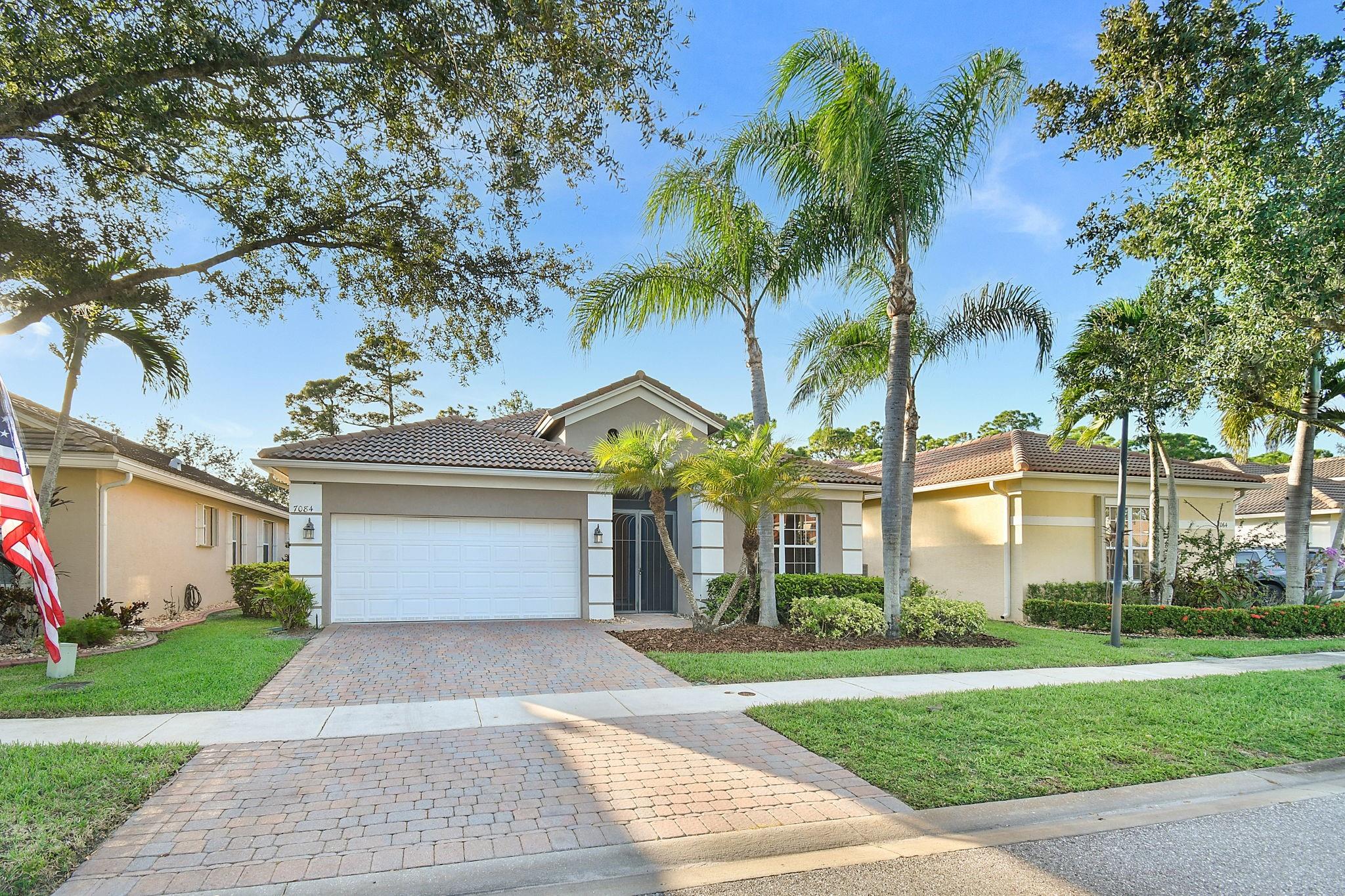 Located on a quiet cul de sac street; this beautiful home has 3 bedrooms, 2 bathrooms, vaulted ceilings, open living and dining area. The split bedrooms floorplan offer privacy for each occupant. The spacious primary bedroom has tray ceilings and 2 walk-in closets. Enjoy all that Florida nature has to offer while sitting in the huge screen lanai.  This gated community offers: resort style pool, tennis and pickle ball courts, gym in the clubhouse and several activities organises by residents. HOA of $590 quarterly include: basic cable and internet, access to all amenities and on site manager on weekdays. Capital contribution: $1500. Summerfield Application: $200. The golf course is pay as you play. Located close to all services, beaches and I-95. A must see before you buy in the area!