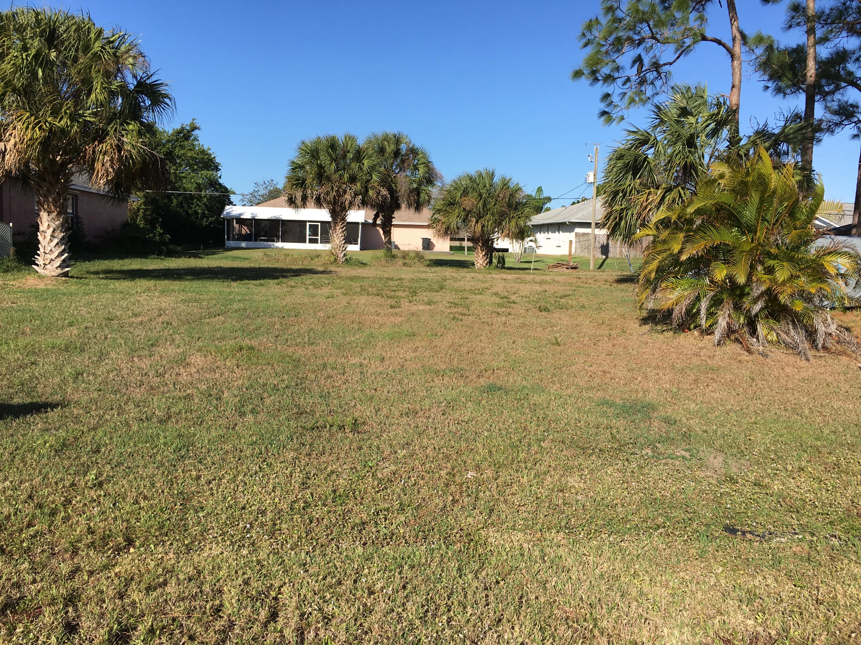 Looking for a lot to build your starter home or down sizing? This is ideal for you. It is centrally located to everything Port St. Lucie has to offer. The new county boat launch is right around the corner. This property is located near the turnpike entrance, churches shopping and eateries are all right out the door. With a preserve buffeting the North Fork of the St. Lucie River, no one can build across the street. COME SEE FOR YOURSELF!