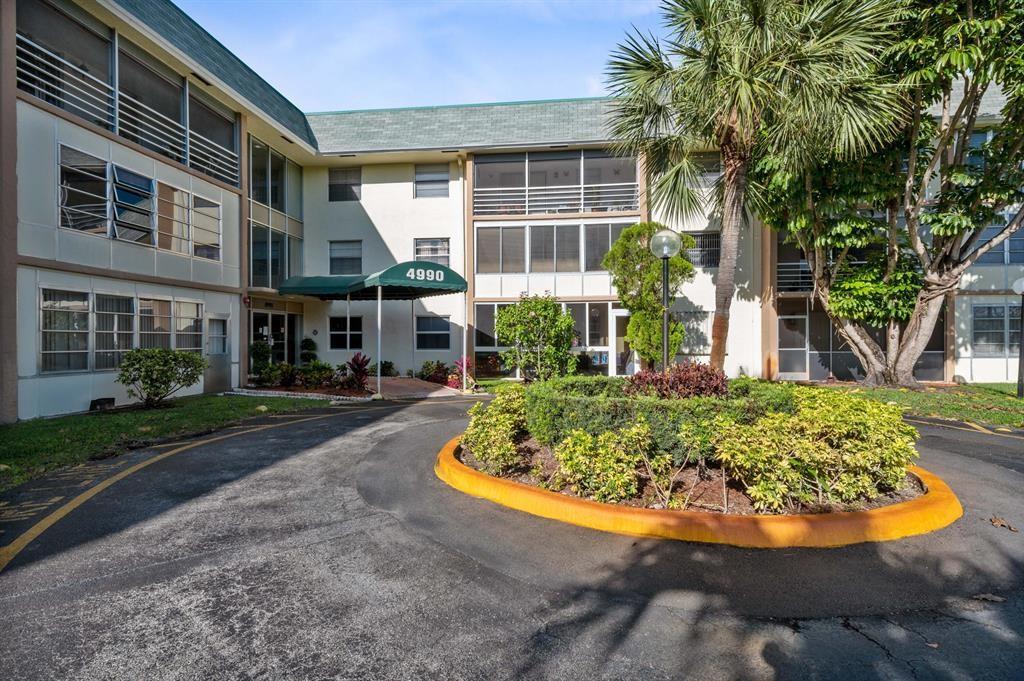 READY TO RENT? THIS 55+ Community is READY FOR YOU!! Take the elevator or get your steps in as you head up to this 2/2 on the 2nd Floor. Granite counters & laminate floors in the living area. Open kitchen to living and dining room area. Extra Storage unit included. Common area Laundry on the same floor. Secured building and lobby area. Sit on you balcony and enjoy the sunshine or walk across to the clubhouse and take advantage of all the amenities: heated pool, library, billiards, tennis, exercise room, BBQ area & more.