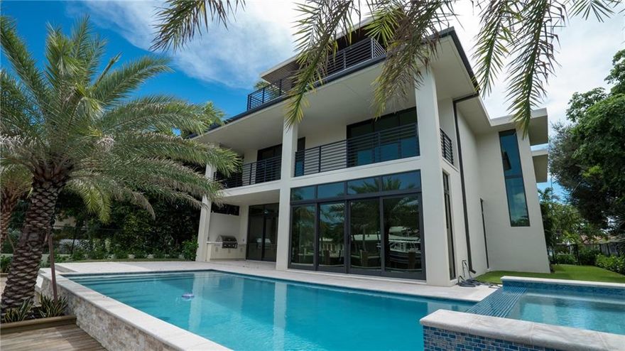 New construction 2017 by award winning Hart Homes.  Modern elegance and design by Juxtapose Design Group.  Located on a wide yacht turning basin with direct ocean access.  This home is in the heart of Rio Vista and only a short golf cart ride from the Lauderdale Yacht Club.  Entire third floor boasts at the master bedroom suite, vast views of downtown Ft Lauderdale. Elevator access, double laundry rooms, full house water purification system, pool and spa heater, dock power, electric shades...