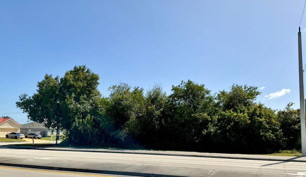 Photo of 306 SW Becker Road, Port Saint Lucie, FL 34953 (MLS # R10957693)