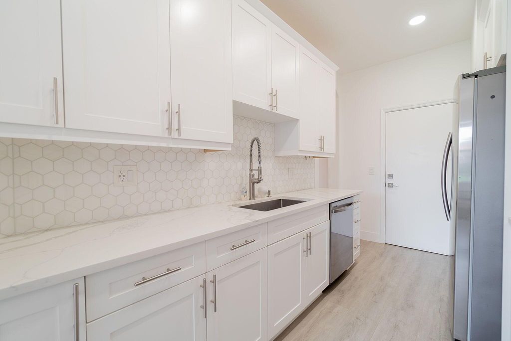 Photo of 205 River Bluff Lane, Royal Palm Beach, FL 33411 (MLS # R11124153)