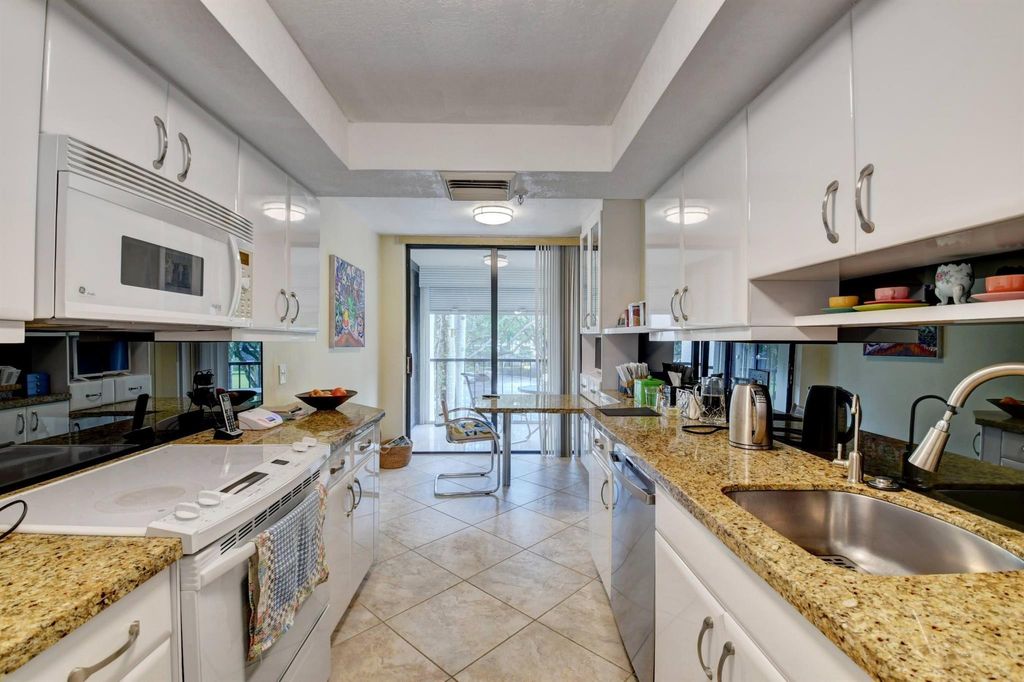 Photo of 20100 Boca West Drive #133, Boca Raton, FL 33434 (MLS # R10903309)