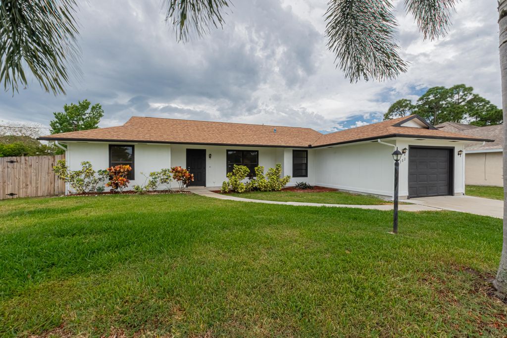 Photo of 782 NW Kilpatrick Avenue, Port Saint Lucie, FL 34983 (MLS # R10792421)