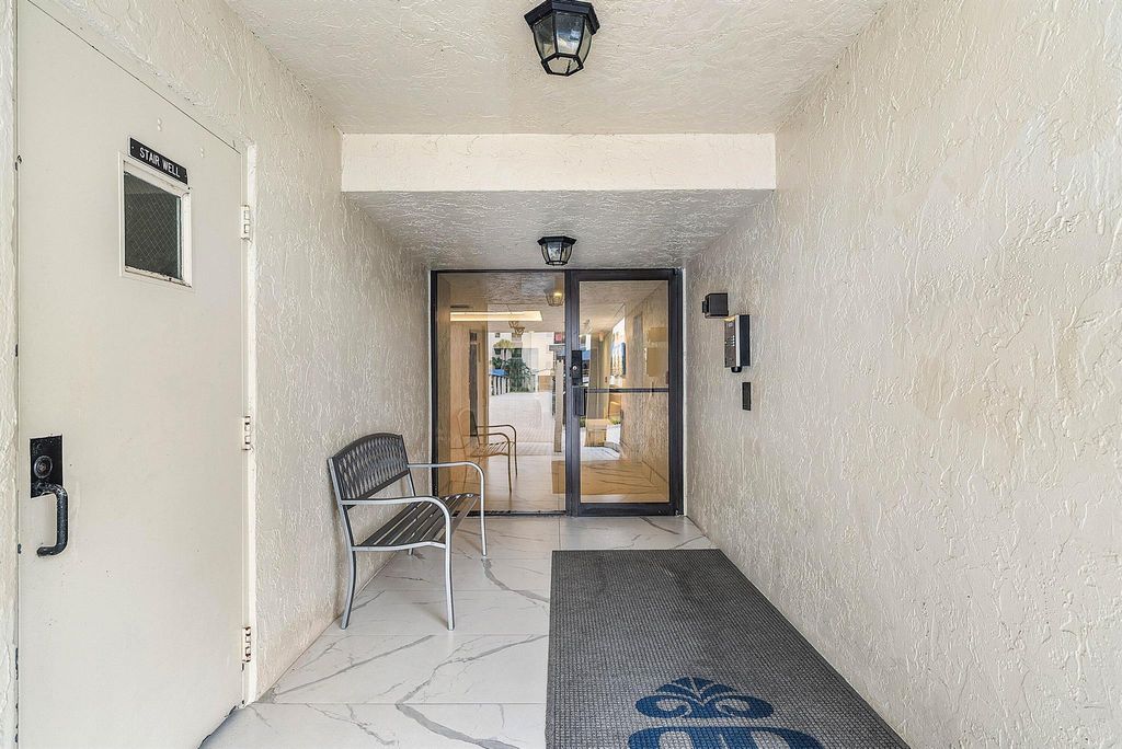Photo of 7580 Regency Lake Drive #402, Boca Raton, FL 33433 (MLS # R11132483)