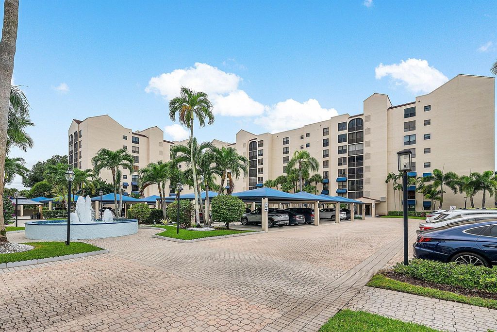 Photo of 7580 Regency Lake Drive #402, Boca Raton, FL 33433 (MLS # R11132483)
