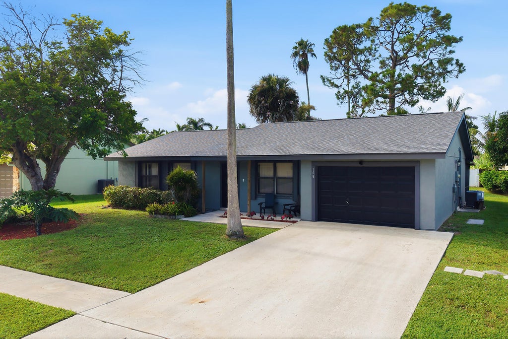 Photo of 108 SANTA MONICA Avenue, Royal Palm Beach, FL 33411 (MLS # B26069350)