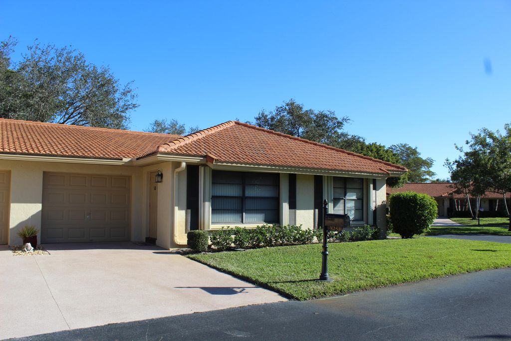 Photo of 9825 Clusia Tree Drive #B, Boynton Beach, FL 33436 (MLS # R11159997)
