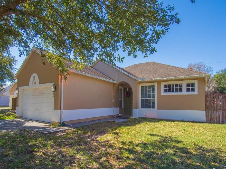 Step into this spacious, move-in-ready home featuring modern plank tile flooring, new baseboards, and a fresh coat of paint throughout. The expansive floor plan includes a luxurious master suite with a generous bathroom boasting dual vanities, a walk-in shower, and a separate jetted tub for ultimate relaxation. Enjoy the Florida lifestyle on the massive covered and screened lanai, perfect for entertaining. Peace of mind comes standard, as all major items have been updated within the past five years. This pristine residence combines comfort and style in every detail. Schedule your tour today!