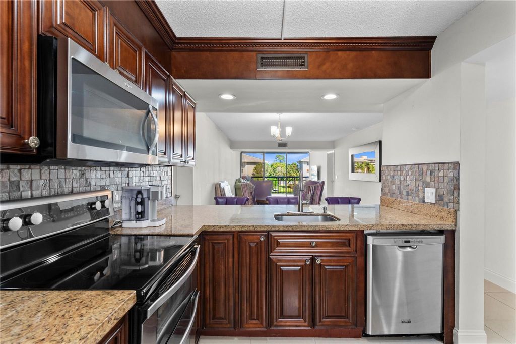 Photo of 6217 Balboa Circle #304, Boca Raton, FL 33433 (MLS # F10503105)