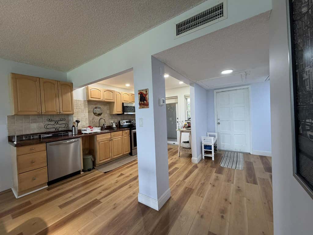 Photo of 3001 S Course Drive #406, Pompano Beach, FL 33069 (MLS # B26059968)