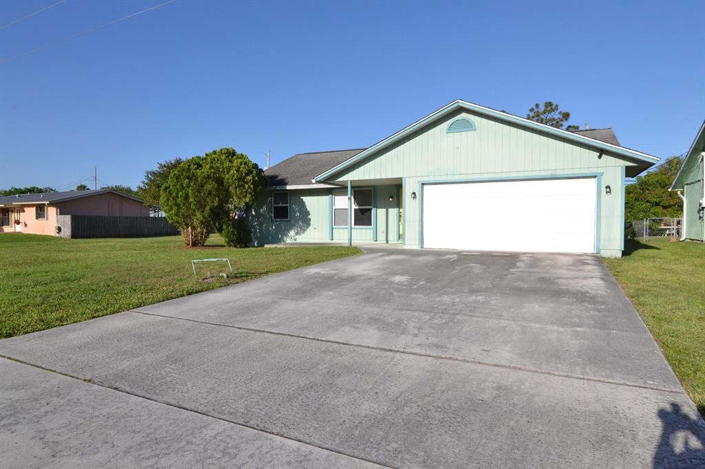 Photo of 5620 SE Normandy Avenue, Stuart, FL 34997 (MLS # R10890043)