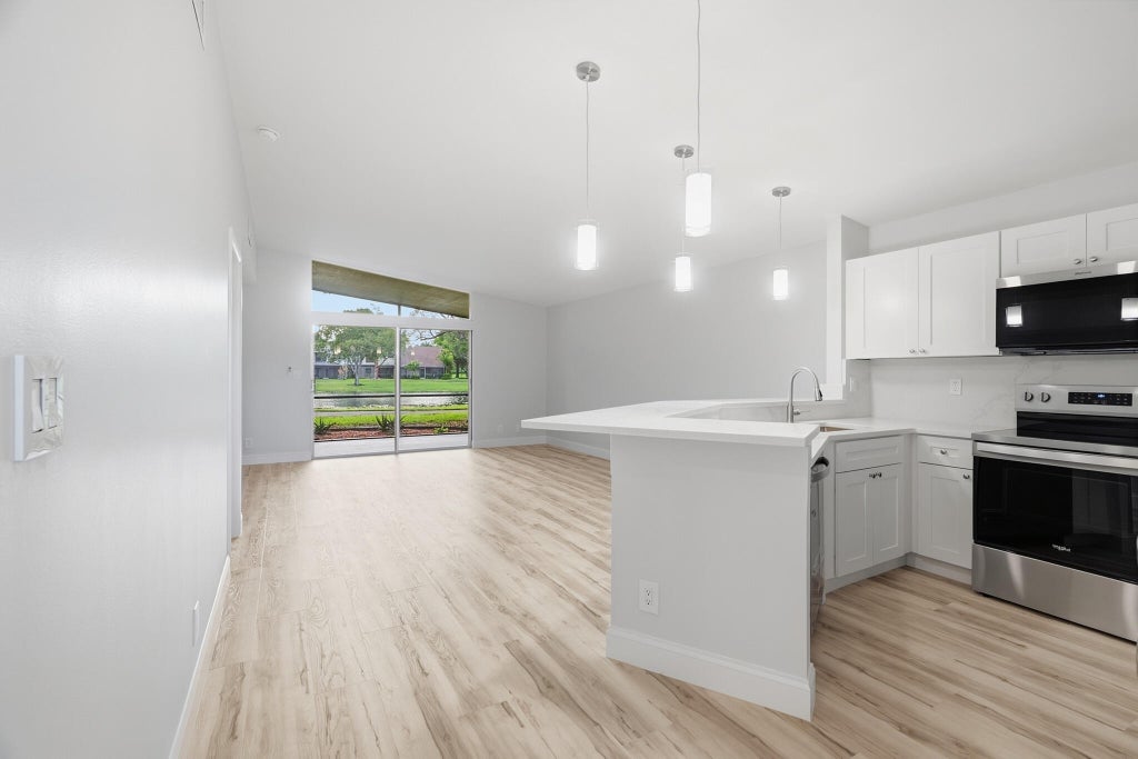 Photo of 11634 ORANGE BLOSSOM Lane #9b, Boca Raton, FL 33428 (MLS # B26093435)