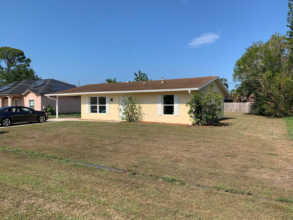Photo of 139 NW Doreen Street, Port Saint Lucie, FL 34983 (MLS # R10992088)