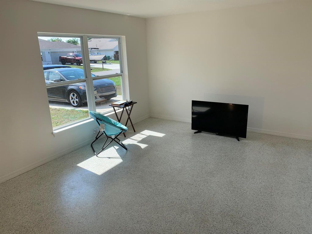 Photo of 139 NW Doreen Street, Port Saint Lucie, FL 34983 (MLS # R10992088)