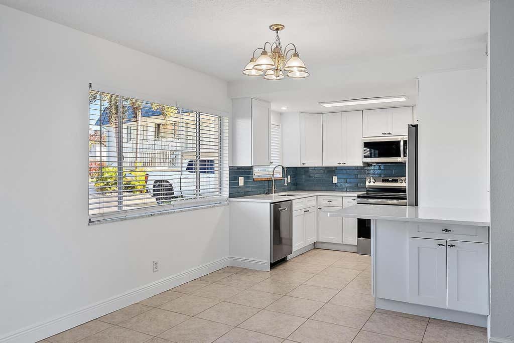 Photo of 316 Southwind Court #Apt 107, North Palm Beach, FL 33408 (MLS # B26062166)