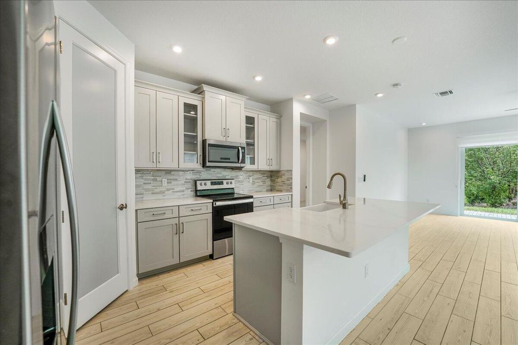 Photo of 6818 Pointe Of Woods Drive, West Palm Beach, FL 33413 (MLS # R11164502)