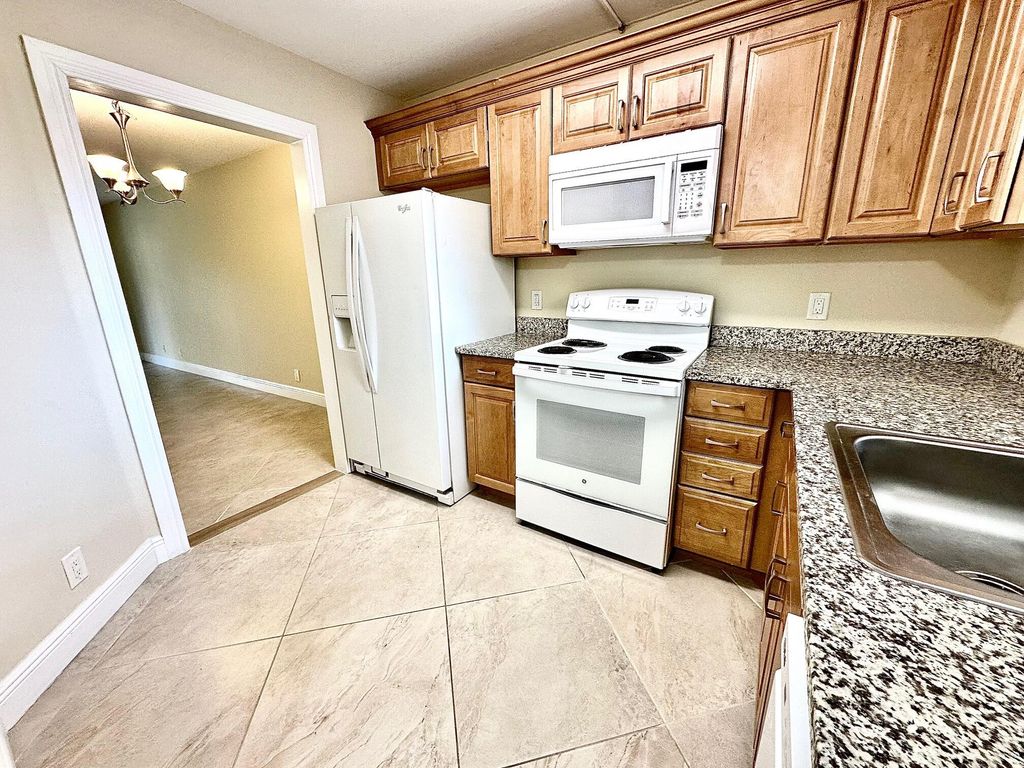 Photo of 21904 Lake Forest Circle #101, Boca Raton, FL 33433 (MLS # B26022961)