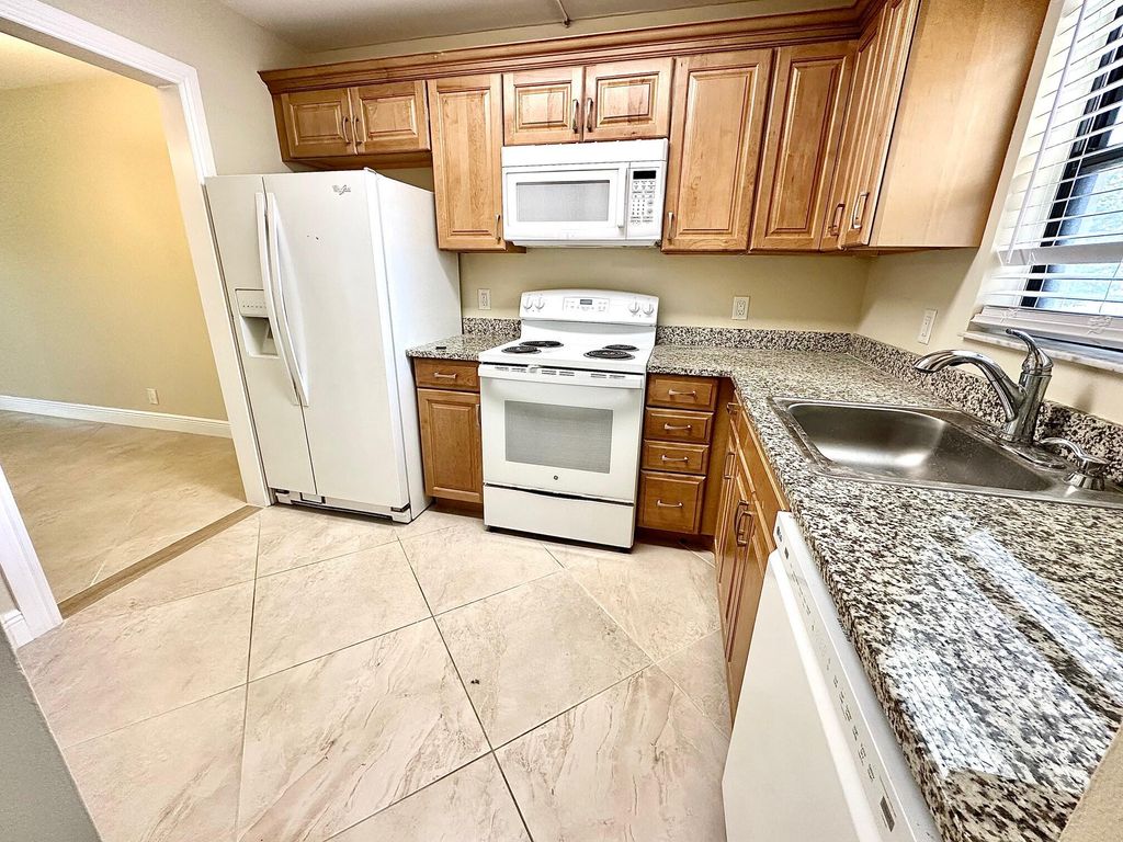 Photo of 21904 Lake Forest Circle #101, Boca Raton, FL 33433 (MLS # B26022961)