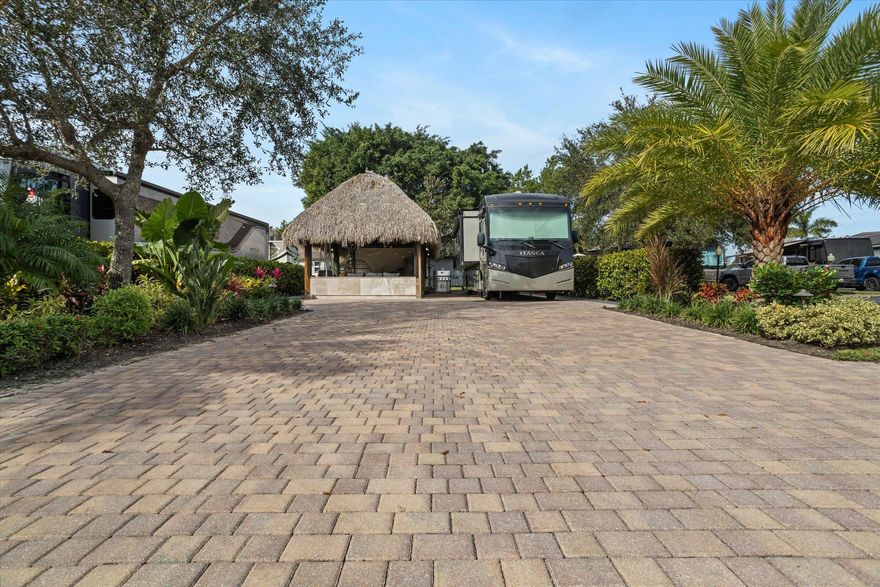 Located within the prestigious Aztec RV Resort, this exceptional property at 204 N Cortez Dr offers a rare opportunity to own in one of South Florida's most exclusive luxury motorcoach communities.  Nestled in a beautifully landscaped, gated 104-acre resort, this oversized lot provides the perfect blend of privacy, elegance, and resort-style living. Designed for Class A motorcoach enthusiasts, the property features a spacious paved site with ample room for custom outdoor living and ideally tailored to fit your lifestyle.  Residents of Aztec enjoy a true five-star experience with world-class amenities including two heated pools and spas, a state-of-the-art fitness center, tennis and pickleball courts, a putting green, and an elegant clubhouse with