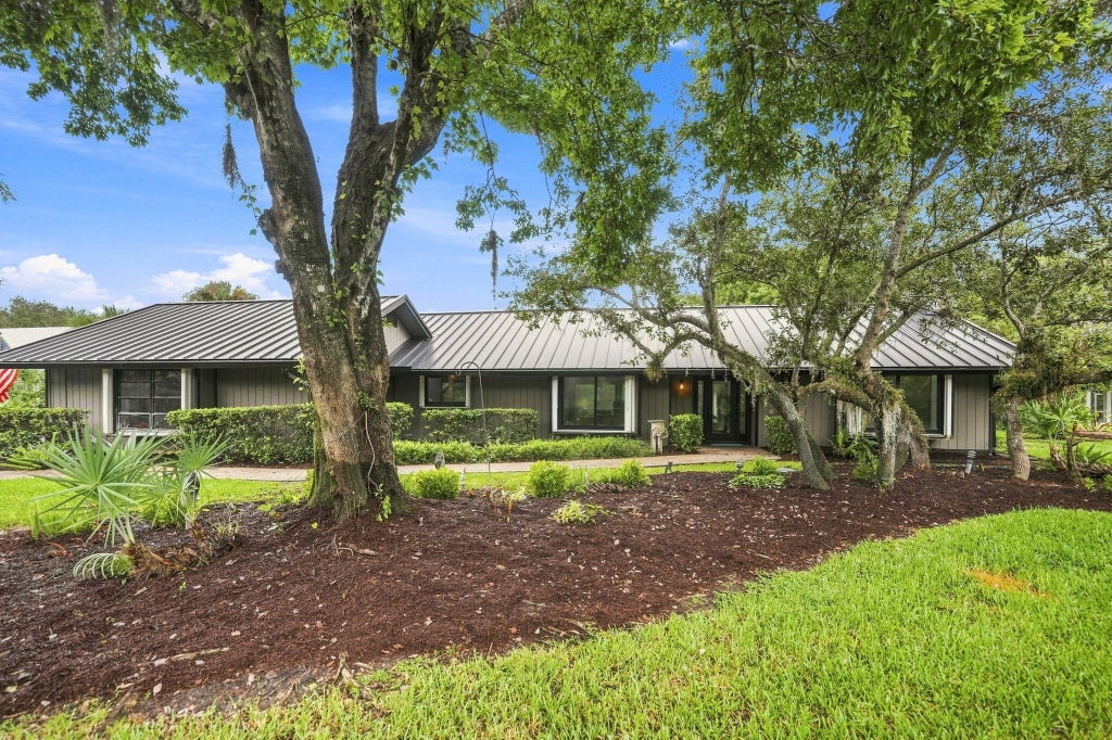 Photo of 3727 SW BRASSIE Way, Palm City, FL 34990 (MLS # B26072105)