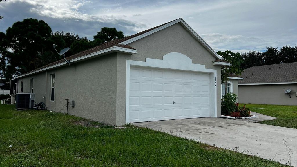 Photo of 1166 SW Heather Street, Port Saint Lucie, FL 34983 (MLS # R11122294)