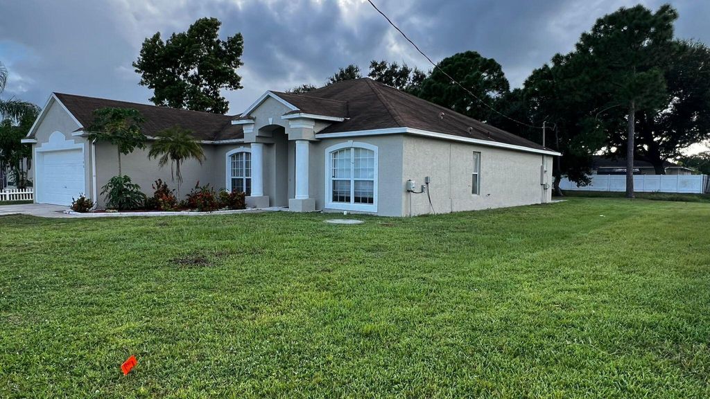 Photo of 1166 SW Heather Street, Port Saint Lucie, FL 34983 (MLS # R11122294)