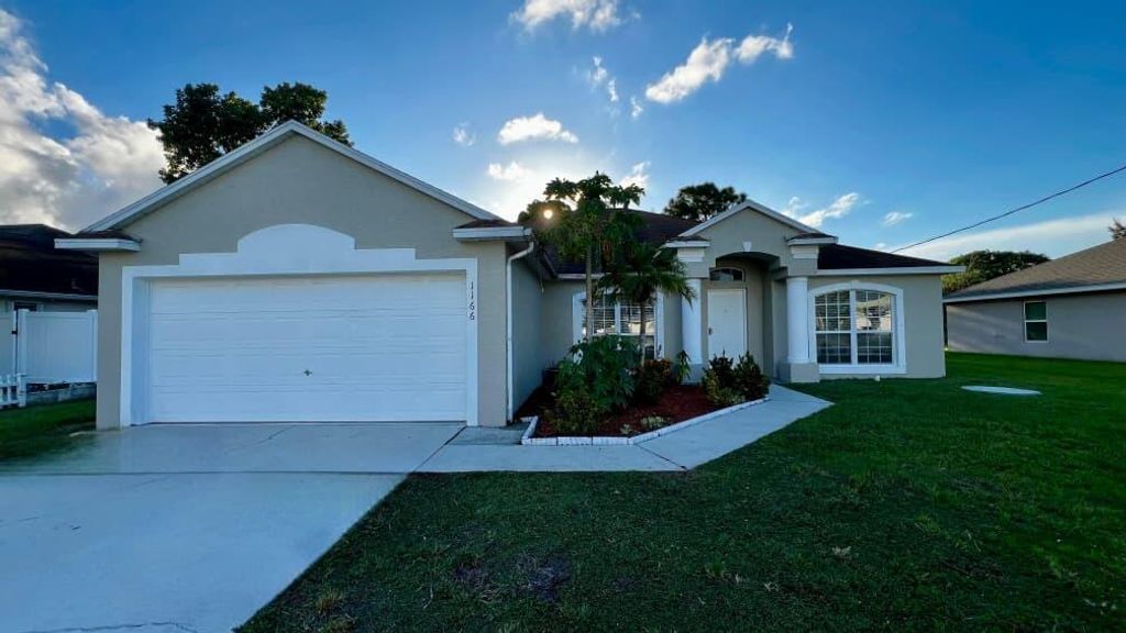 Photo of 1166 SW Heather Street, Port Saint Lucie, FL 34983 (MLS # R11122294)