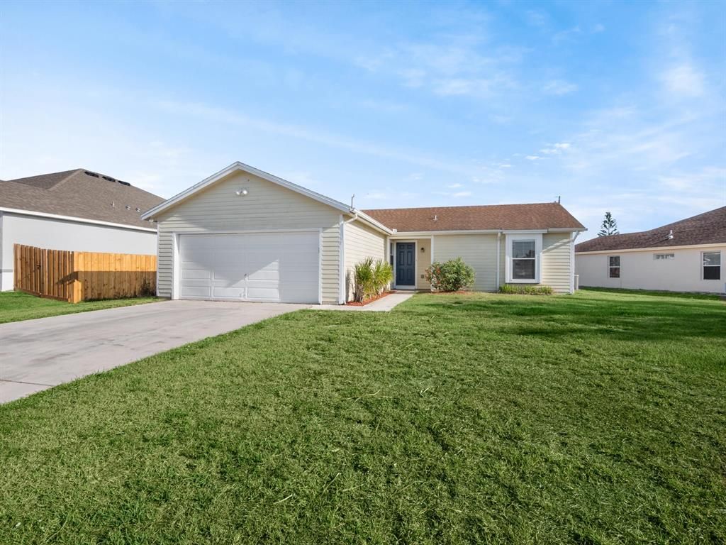 Photo of 437 SW Naftal Avenue, Port St Lucie, FL 34953 (MLS # R10879933)