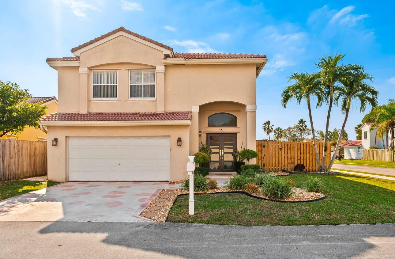 This stunning 2-story property offers brand-new carpet, WiFi Arlo Security System, & an Eco System French Door with impact glass for heat resistance & privacy. The fully updated kitchen & bathrooms feature sleek finishes, & a recent 4-Point Inspection provides peace of mind. The resort-style backyard boasts smart pool equipment, a heated pool with color-changing lights, & a custom hurricane-resistant pergola with a fan & lighting, perfect for entertaining. A new privacy fence, stamped concrete driveway, & tropical landscaping create your private oasis. Additional perks include a semi-annual AC maintenance plan, impact sliding doors, the lowest HOA in the area, & a convenient location near top schools & shopping areas. This home can even be sold fully furnished for an additional cost!