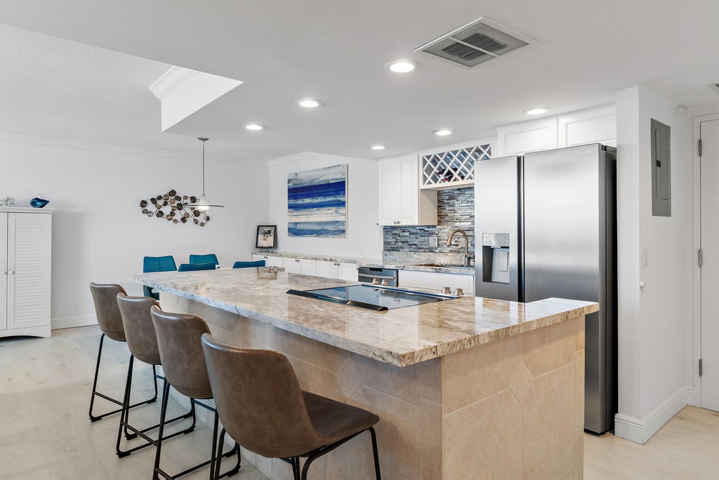 Photo of 5440 N OCEAN Drive #PH205, Singer Island, FL 33404 (MLS # B26089166)