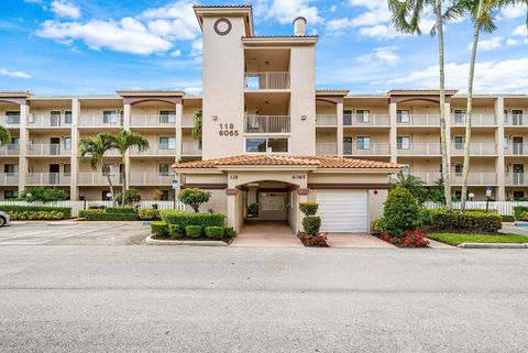 Photo of 6065 Pointe Regal Circle, Delray Beach, FL 33484 (MLS # B26015548)