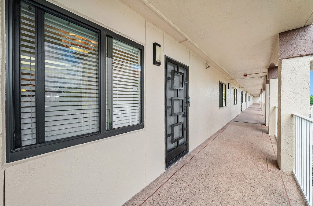 Photo of 6065 Pointe Regal Circle, Delray Beach, FL 33484 (MLS # B26015548)