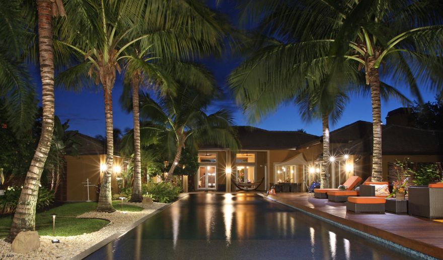 MAJOR PRICE REDUCTION, motivated Sellers, bring all offers. This one-of-a-kind equestrian property has everything you could wish for and more! Sitting on 4.7 acres with city water, this 6 bedroom, 5.1 bath home is surrounded by lush landscaping that creates a feeling of seclusion. The main house includes a Modulnova Italian kitchen with Wolf appliances and a generator that supplies half the house and wine cellar. The grounds, including a 2 bedroom, 1 bath guest house and beautiful infinity pool with cabana bath, along with the tiki hut and outdoor kitchen, only add to the peacefulness and tranquility of the property. The 19 stall barn includes a rider's lounge with full bathroom, an upstairs loft used as an office, and a 2 bedroom grooms quarters. An incredible feature of the feed room is