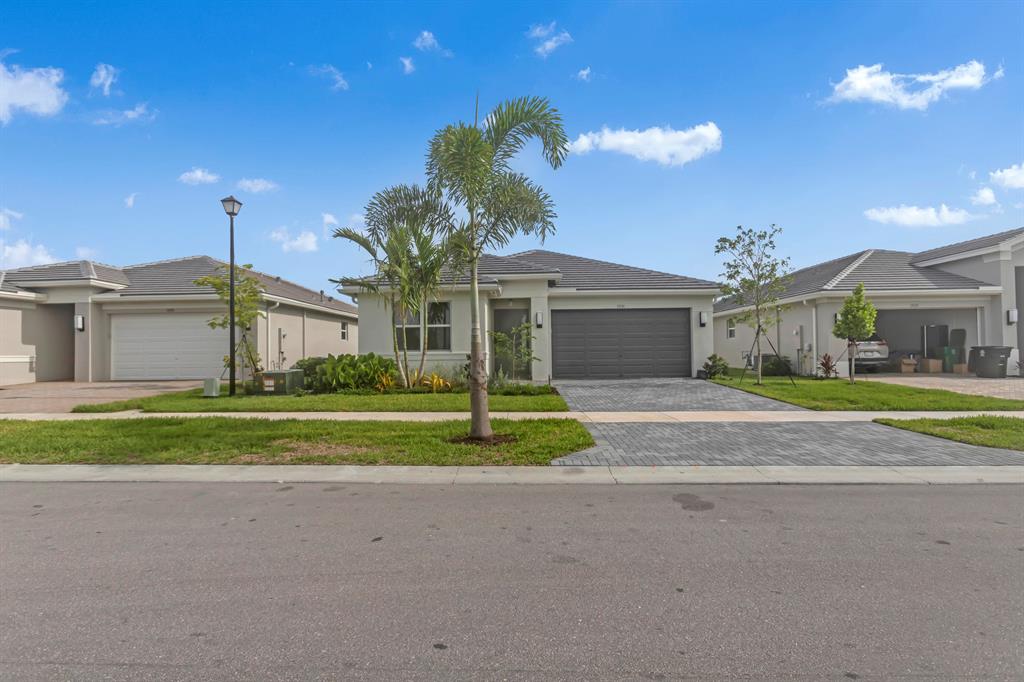 Welcome to your dream home in Port Saint Lucie! Be the first to live in this new 'Sandpiper model' home with water view, in the highly sought-after community of Valencia Grove. Boasting a spacious layout, exquisite finishes, and an abundance of amenities, this home offers an unparalleled living experience. The open-concept design creates a perfect space for both relaxation and entertainment. Enjoy resort-style living with pickleball courts, tennis courts, restaurant, and cabana life by the pool! Do not miss out to rent in this incredible development.
