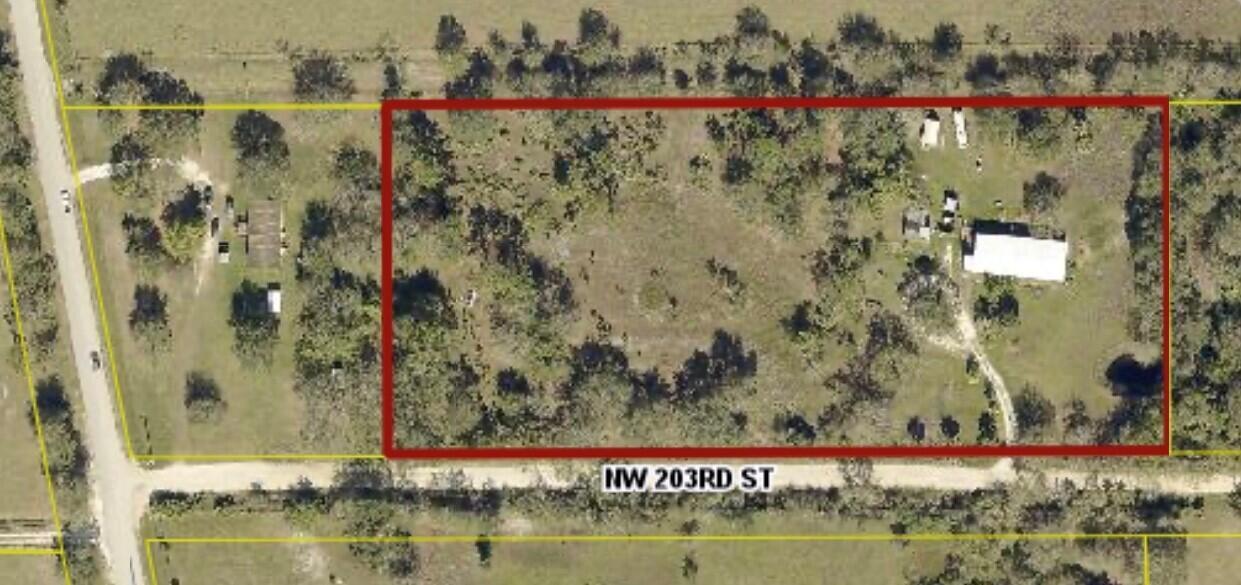 Beautiful and Spacious! Five Acres Fenced in the Country, with a 4 Bedroom 2 Bath Mobile Home. A separate Family/Bonus Room in the Home, Newer Roof, Brand New A/C and Duck Work, Two Storage Facilities, one with Electric. There is A Pond on the Property to stock with fish. This property is Private, Peaceful, with plenty of room for your livestock or pets. There is so much to love about this property!