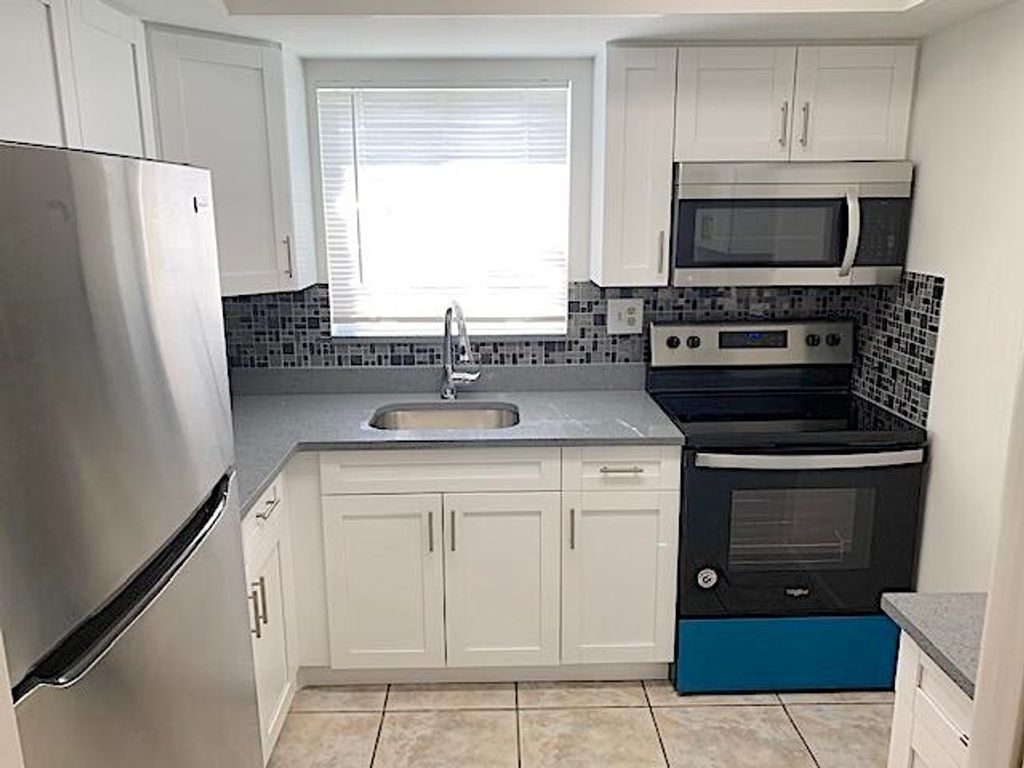 Photo of 2667 Emory Dr Drive W #H, West Palm Beach, FL 33415 (MLS # R11143044)