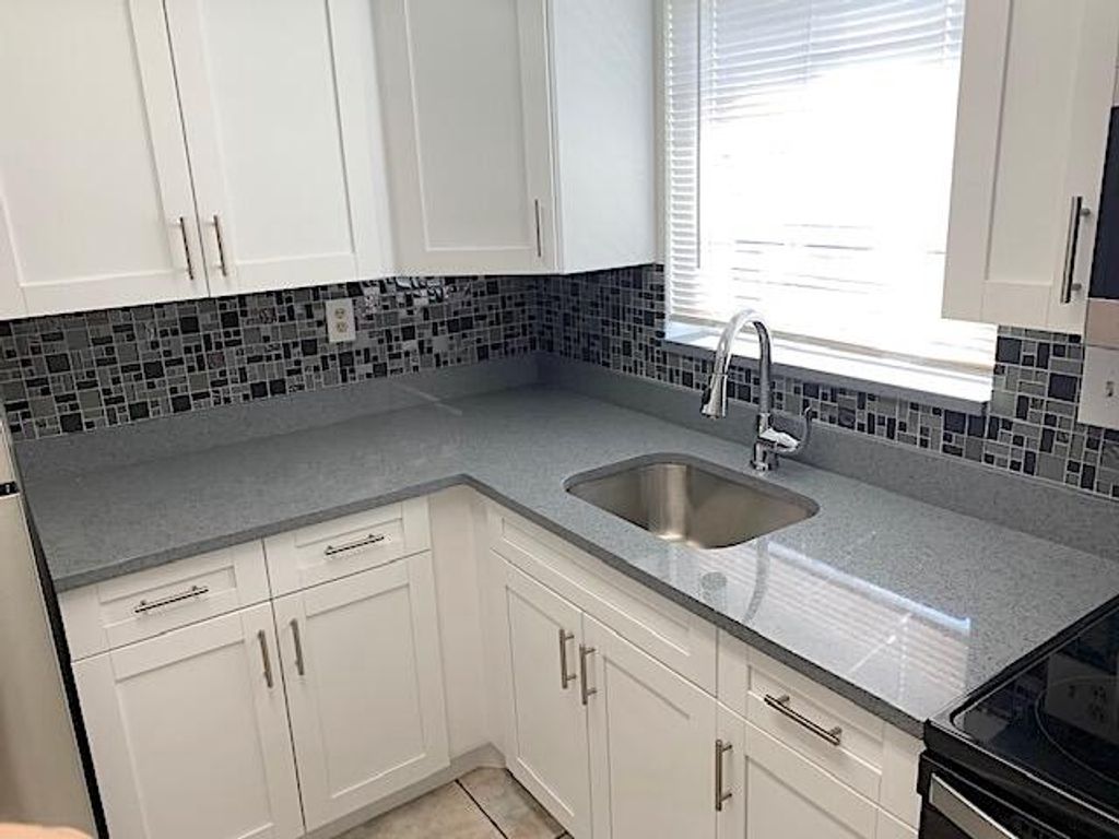 Photo of 2667 Emory Dr Drive W #H, West Palm Beach, FL 33415 (MLS # R11143044)