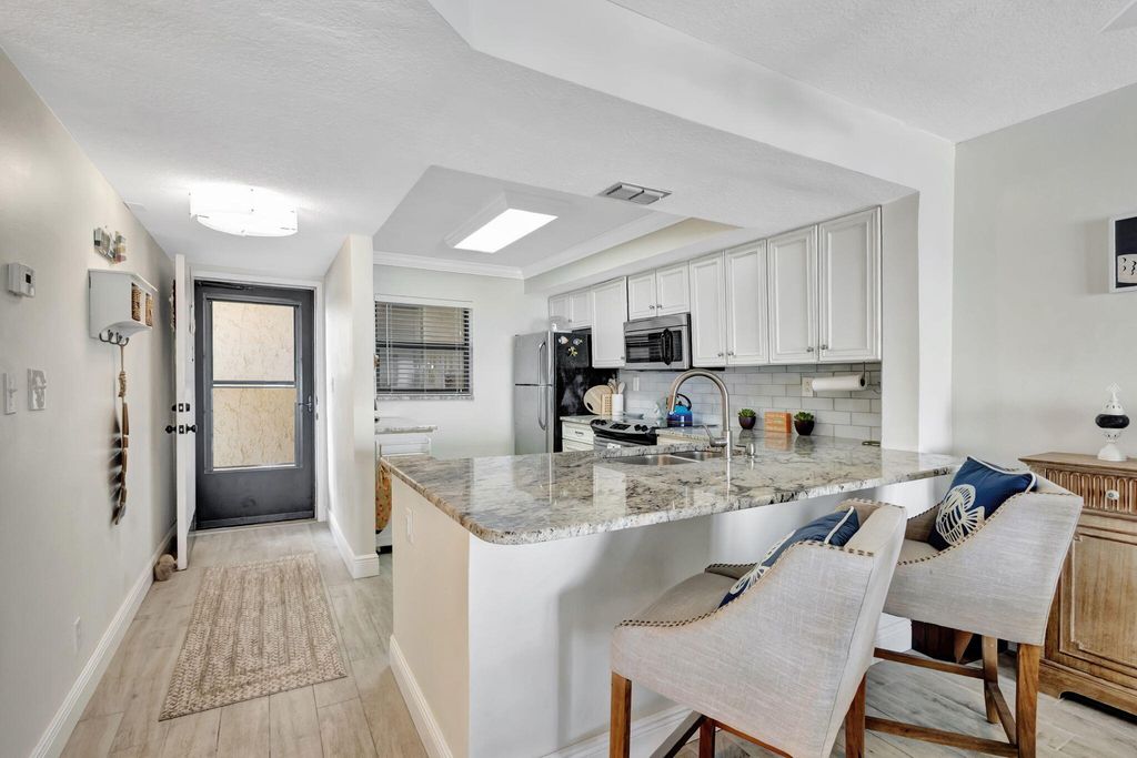 Photo of 9400 S Ocean Drive #405, Jensen Beach, FL 34957 (MLS # R11096638)