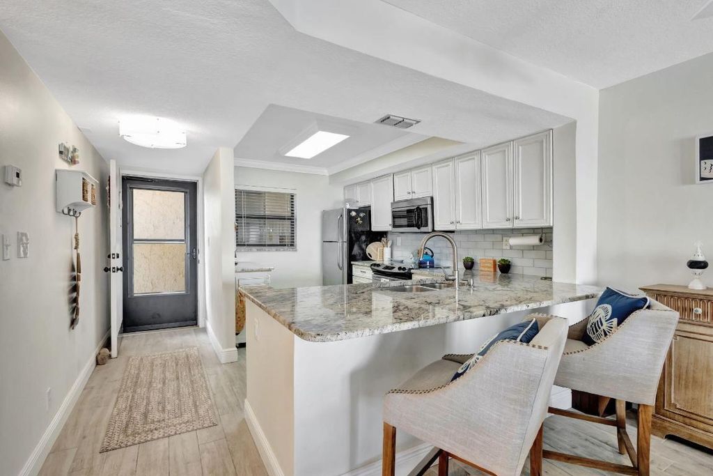 Photo of 9400 S Ocean Drive #405, Jensen Beach, FL 34957 (MLS # R11096638)