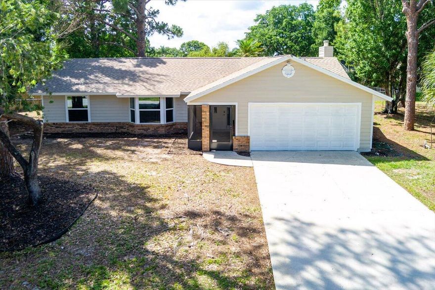 4 BR, 2 BA totally updated. Exterior features all new thermo windows t/o, garage door with EGDO, new springs & rail, Architectural roof installed 2020. Freshly painted screened in patio with 24x24 tile floor and new lighting. New garage access doors, frosted glass door in family. .37 fenced in lot. Interior features new vinyl flooring t/o. 6" baseboard, wide window & door casing. New 2 panel doors, 7  ceiling fans & new light fixtures. LED can lighting t/o most of home. Kitchen features 42" white shaker soft close cabinets, quartz counters, big island center, ceramic backsplash, deep SS sink & SS appliances, all new except microwave )2020). Lg Master bedroom with big walk in closet. Both baths updated with light up mirrors, vanity, tile floor & walls. Split to be installed in family room.