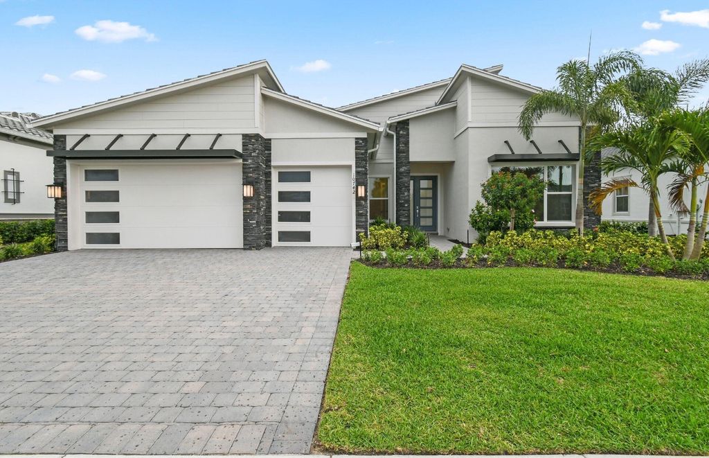 Photo of 10742 Stellar Circle #Stellar 11, Palm Beach Gardens, FL 33412 (MLS # R11094883)