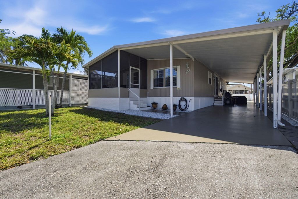 Photo of 2340 SW 51st Ct, Fort Lauderdale, FL 33312 (MLS # B26000154)