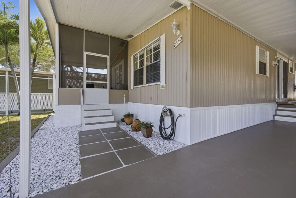 Photo of 2340 SW 51st Ct, Fort Lauderdale, FL 33312 (MLS # B26000154)