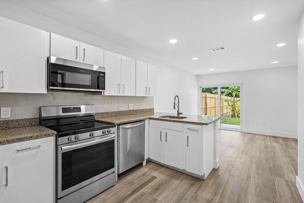 Photo of 1303 White Pine Drive, Wellington, FL 33414 (MLS # R11128139)