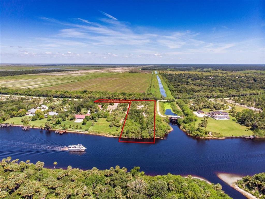 2.28 Acres right on the River, Connecting the east coast with the west coast of Florida! Enjoy Lake Okeechobee or the Stuart Inlet. Wide water view! Build your own Dream Home and Dock.