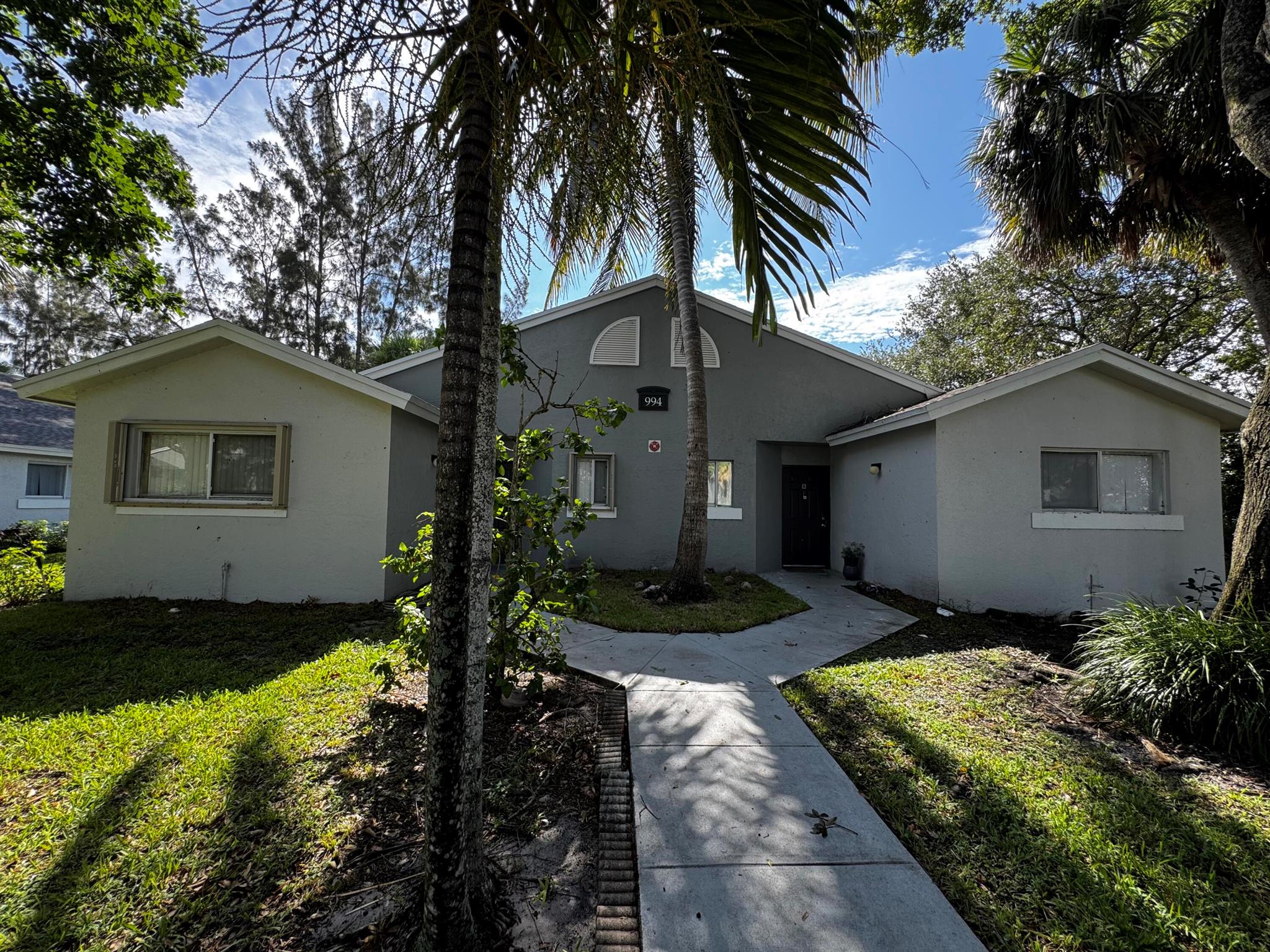 Great value for investor or 1st time home buyer. First floor 3 bedroom 2 bathroom unit offers everything you need. Tiled floor throughout, wood kitchen and vanity cabinets, granite countertops, fresh paint. Beautiful open balcony views. New blinds and new smoke detector. Every room have ceiling fan and lights. Accordion shutters gives extra protection for the whole house. HOA pays for water, lawn care, tree trimming, roof and exterior painting . New roof and Painting , no special assessment. Community has 3 swimming pool, 2 fitness room, laundry facilities, club house, kids playground, picnic areas. The unit is located in the desirable St Andrews palm beach estate, close to school, mall and shopping center.