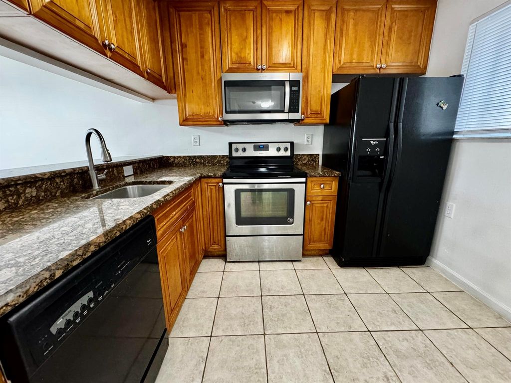 Photo of 994 Lake Terry Drive #A, West Palm Beach, FL 33411 (MLS # R11117975)