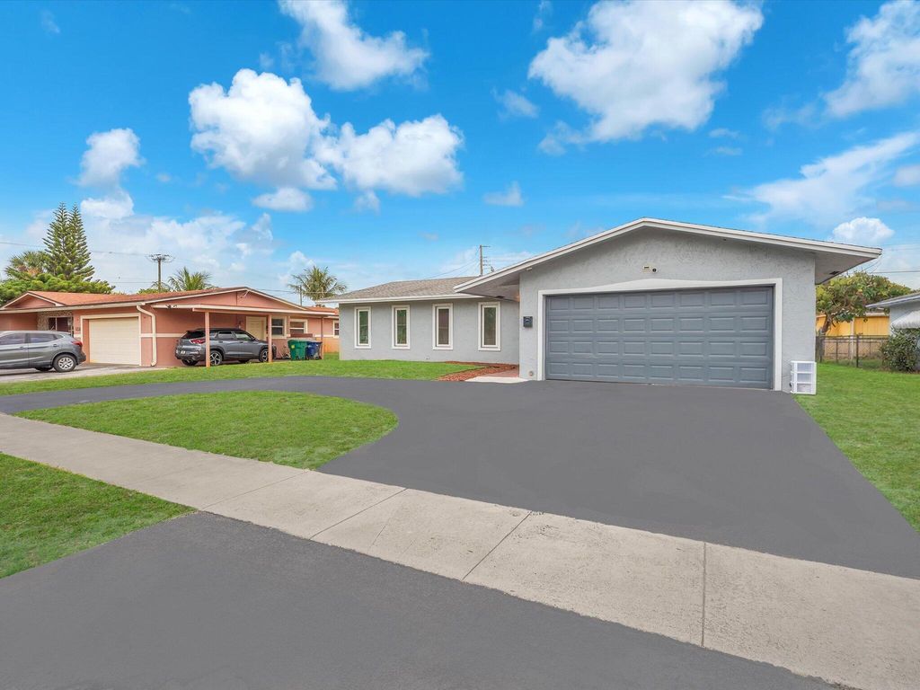 Photo of 4710 NW 16th Court, Lauderhill, FL 33313 (MLS # B26007368)